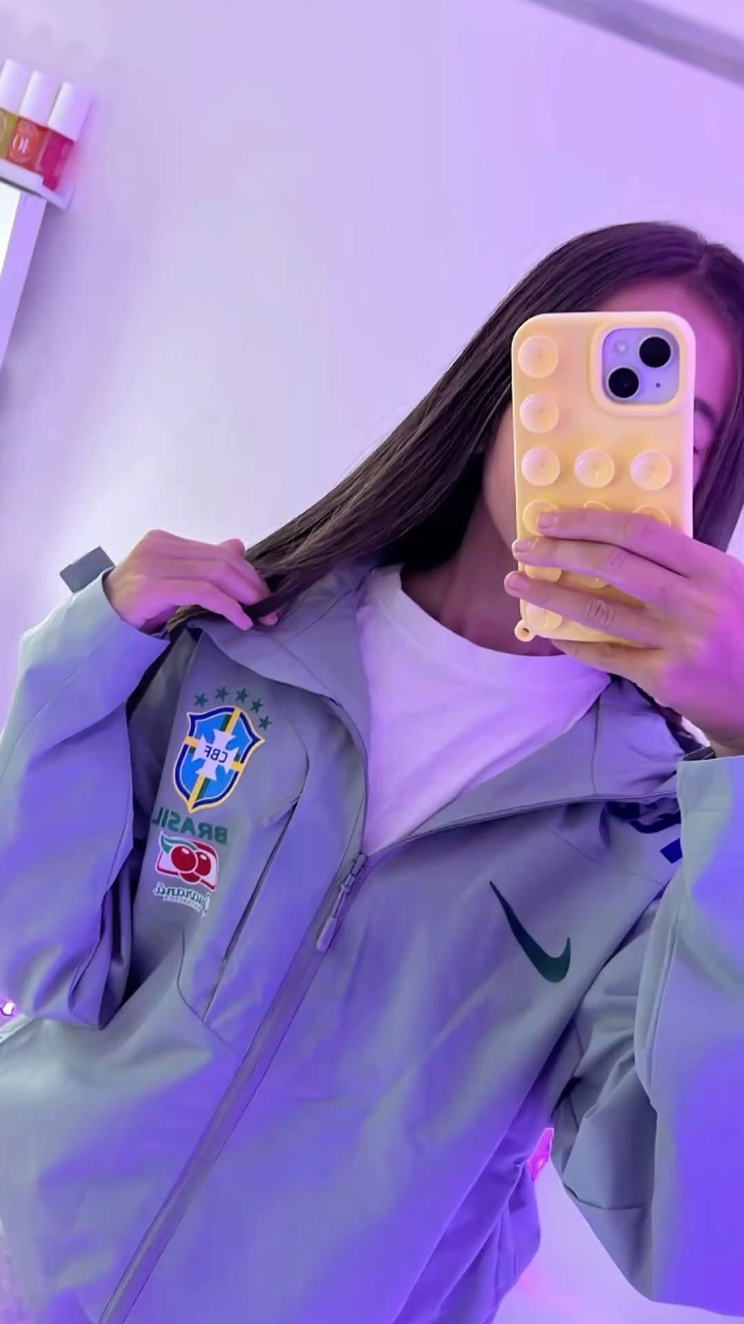 Light jacket under purple lighting